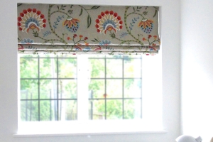 roman blind in colefax and fowler fabric